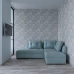 Un salon moderne avec canapé bleu, mur géométrique, parquet clair et fenêtre